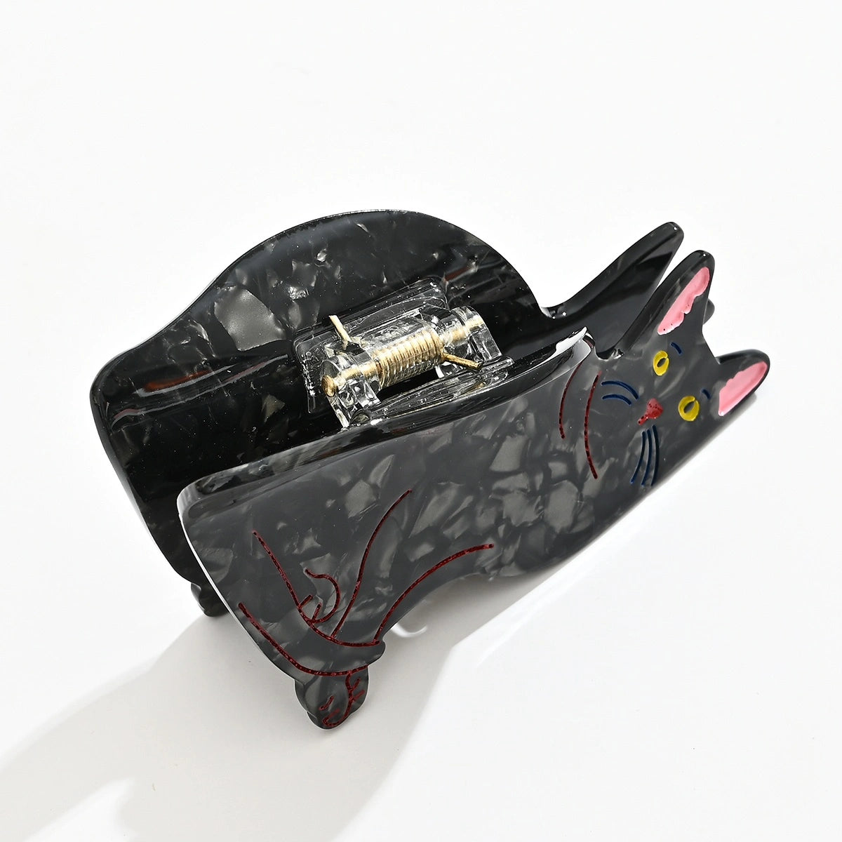 Pince cheveux chat femme en acétate noire, 8 cm. Accessoire coiffure original et élégant, idéal pour cheveux fins à normaux, usage quotidien.