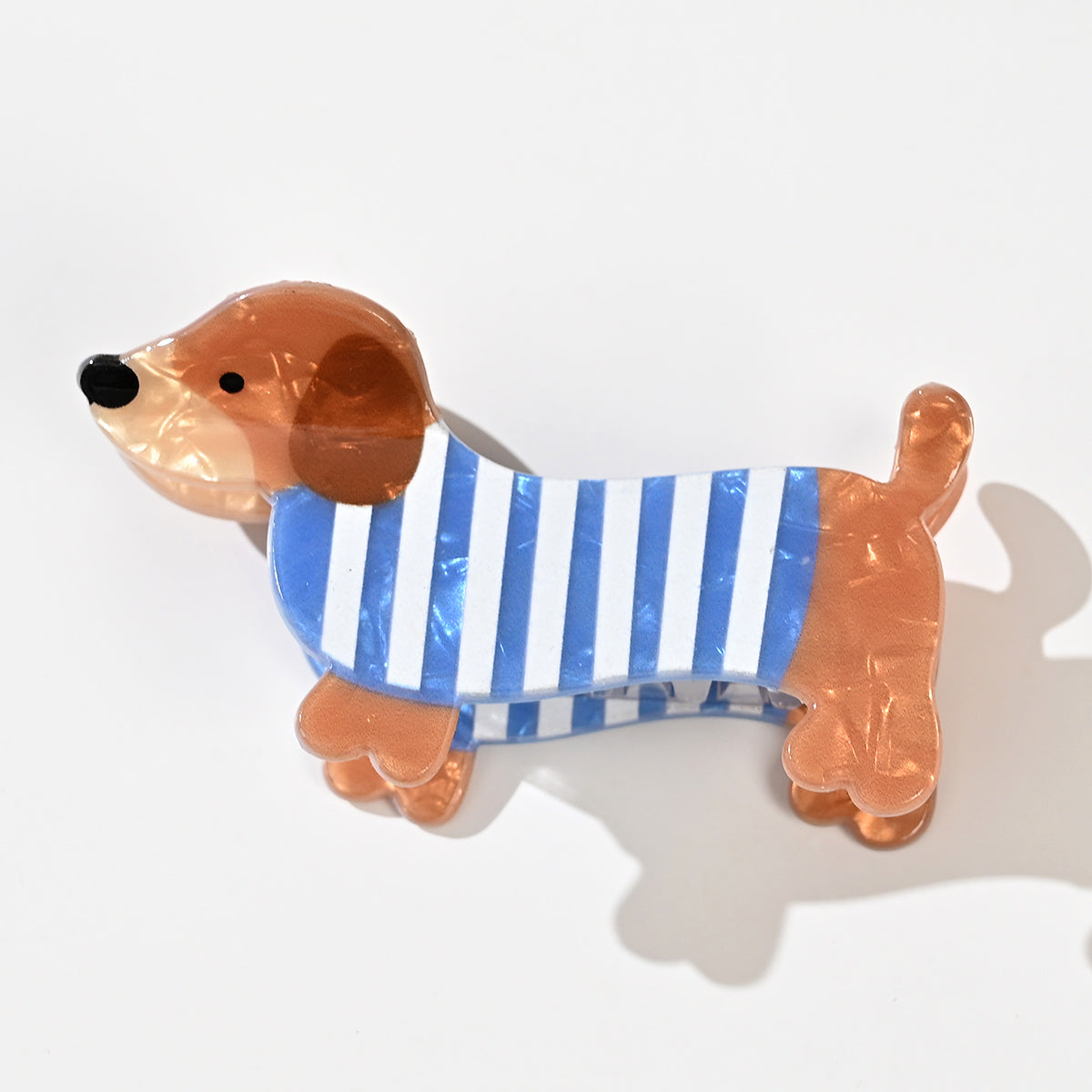 Pince cheveux Chien de 7,5 cm disponible en marinière bleue ou pull rose. Accessoire cheveux original et tendance, parfait pour offrir ou se faire plaisir.