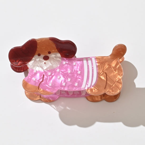 Pince cheveux Chien de 7,5 cm disponible en marinière bleue ou pull rose. Accessoire cheveux original et tendance, parfait pour offrir ou se faire plaisir.