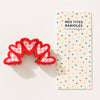 Barrette vichy cœur en acétate de 9 cm. Accessoire cheveux élégant et tendance offrant un excellent maintien, idéal pour offrir ou se faire plaisir.