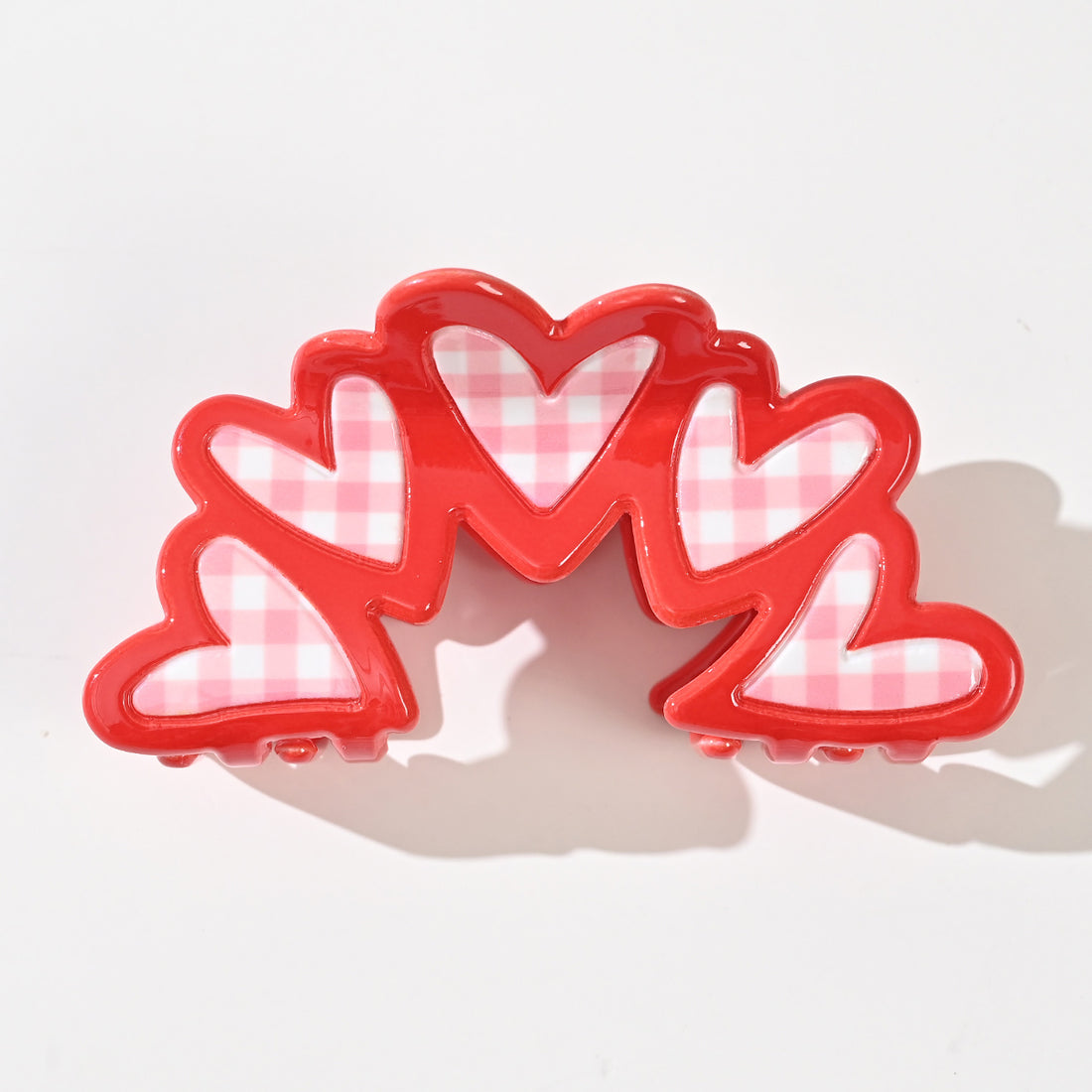 Barrette vichy cœur en acétate de 9 cm. Accessoire cheveux élégant et tendance offrant un excellent maintien, idéal pour offrir ou se faire plaisir.