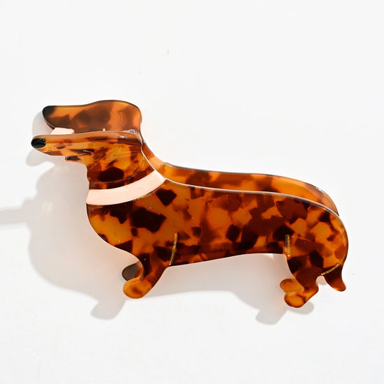 Pince cheveux chien en acétate écaille 9,5 cm. Accessoire coiffure original et tendance, idéal pour cheveux mi-longs à longs, maintien confortable.
